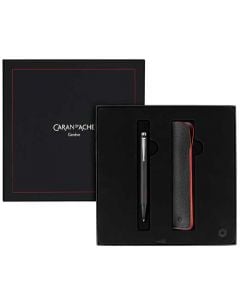 This Caran D'ache Ecridor pen set comes with a ballpoint pen and matching leather pen case.