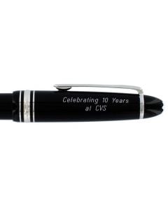 An engraved Montblanc pen cap in grotesque italics.