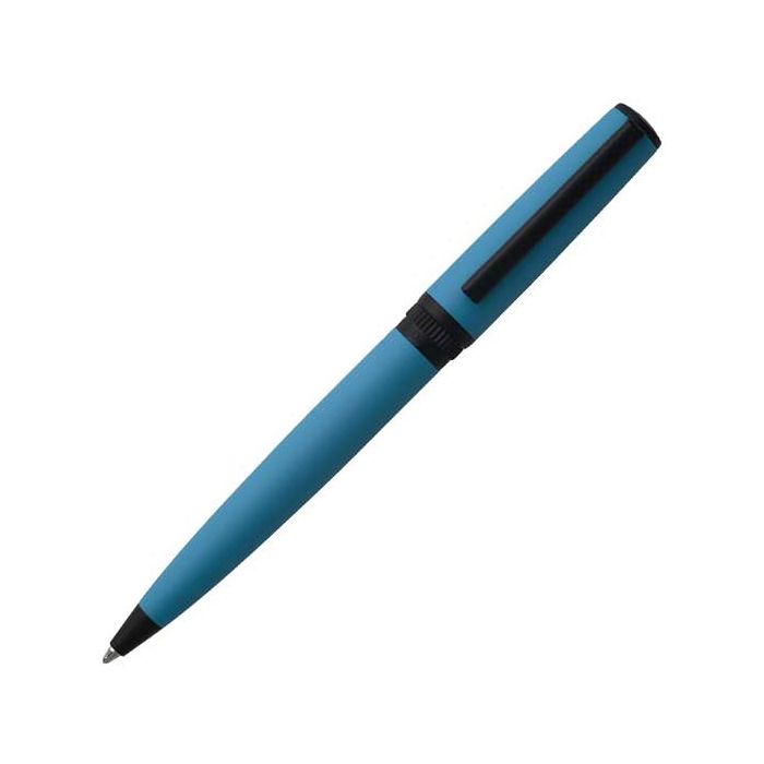 The Hugo Boss, Gear, Matrix Teal Lacquer Ballpoint Pen uses a twist release mechanism to reveal the smooth glide cartridge inside.