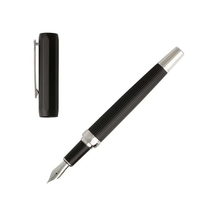The Hugo Boss, Grace, Black Anodised Aluminium & Chrome Plated Brass Fountain Pen is finished with a steel nib and dual finish design.