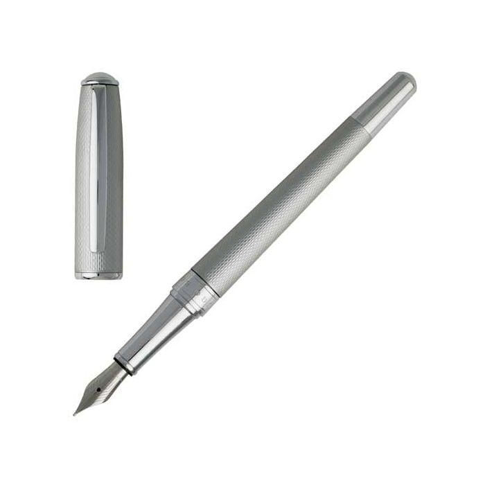 The Hugo Boss, Essential Matte effect Chrome Fountain Pen features a highly engraved body and cap, trimmed with polished chrome and a steel nib.