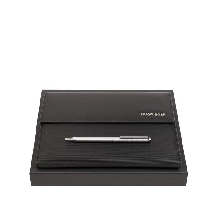 This Cloud Chrome Ballpoint Pen & Black Pinstripe A5 Folder Set is designed by Hugo Boss. 
