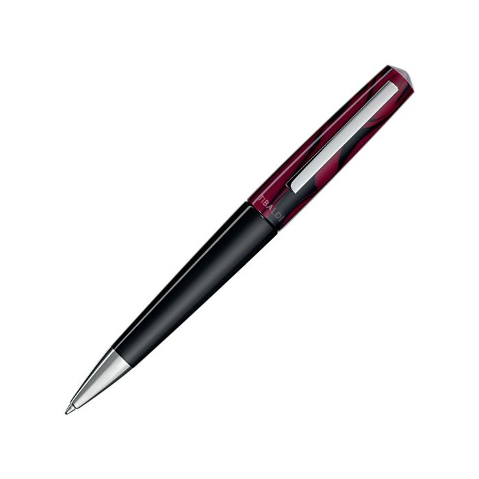 This Mauve Red Infrangibile Ballpoint Pen has been designed by TIBALDI.