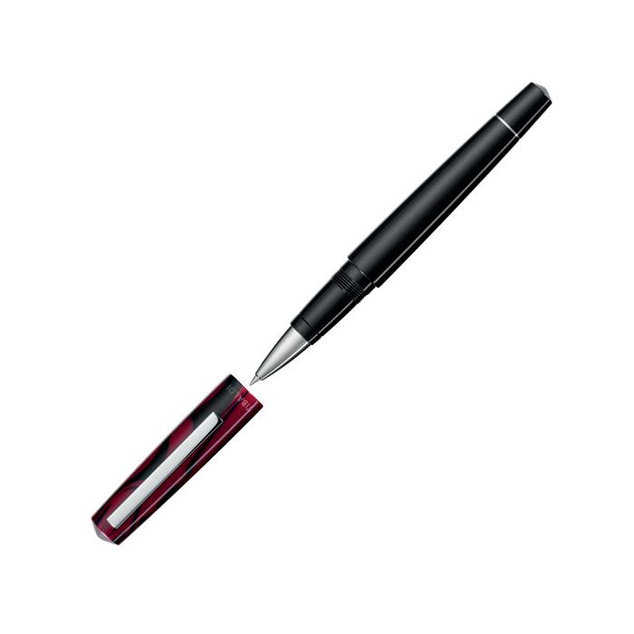 This Mauve Red Infrangibile Rollerball Pen has been designed by TIBALDI.